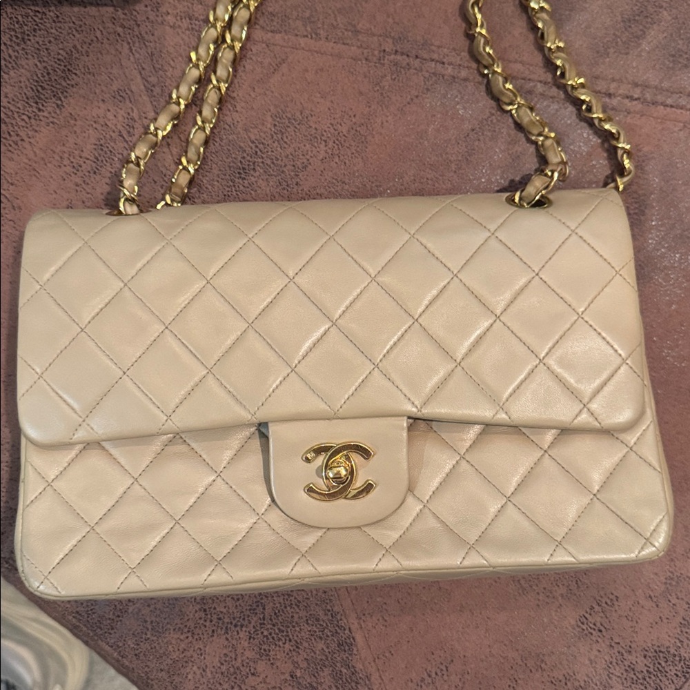 CHANEL vintage Chanel 2.55 10" flap bag made of cream lambskin leather